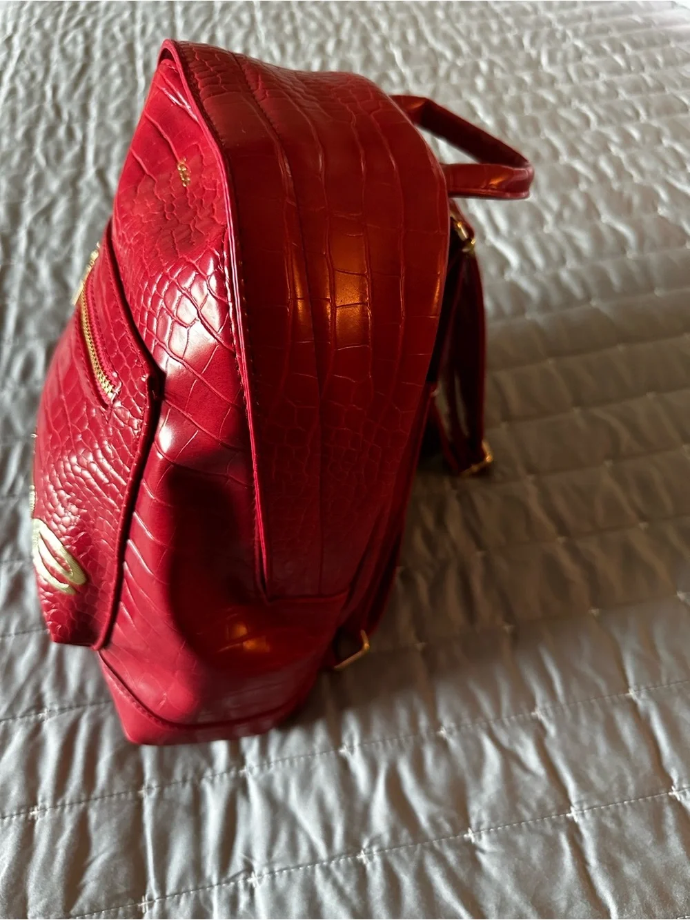 bebe Shiny Red Croc-Embossed Mini Backpack with Gold Logo
